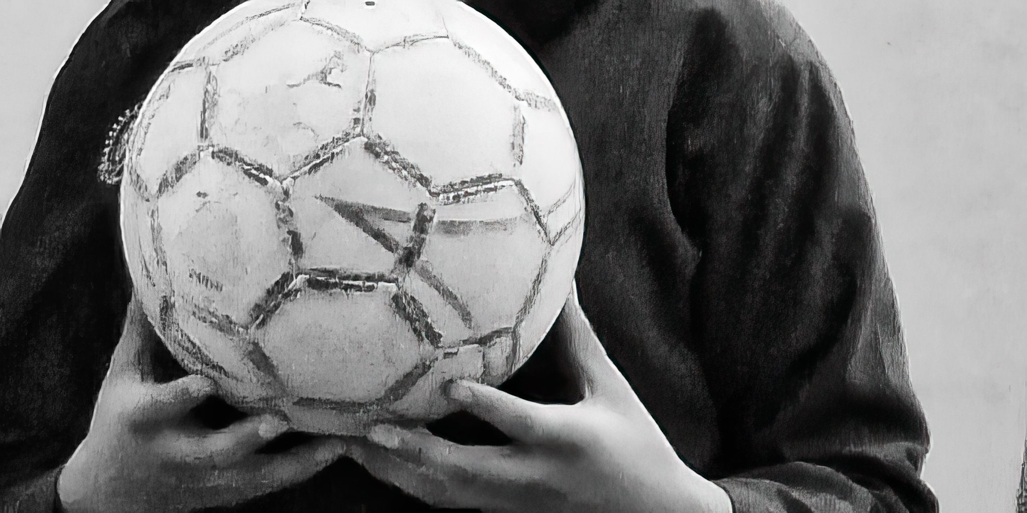 A girl holds a soccer ball, Kabul, 2009