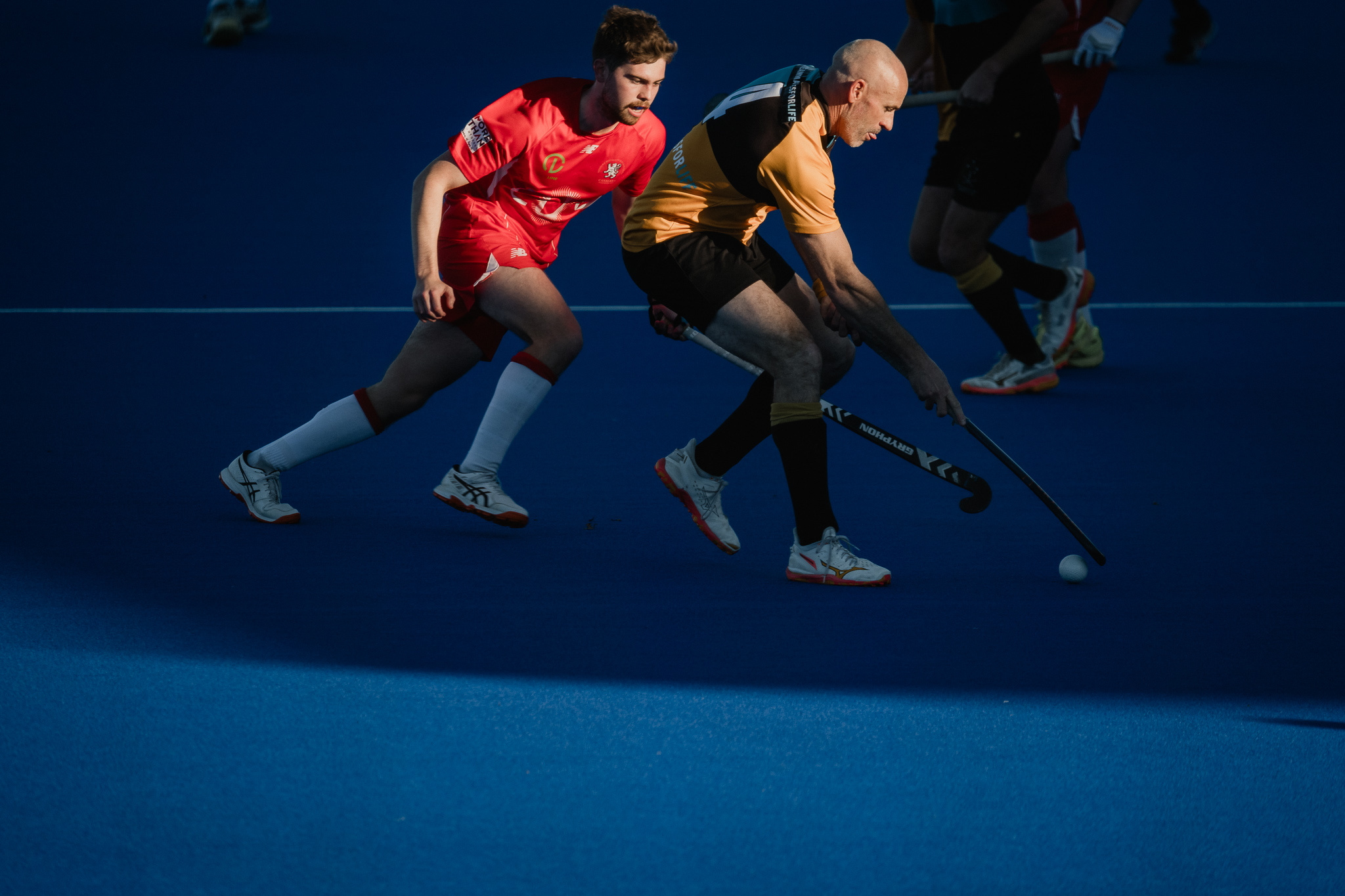 Source photograph, Hockey ACT, straight out of camera, shot with deliberate negative space