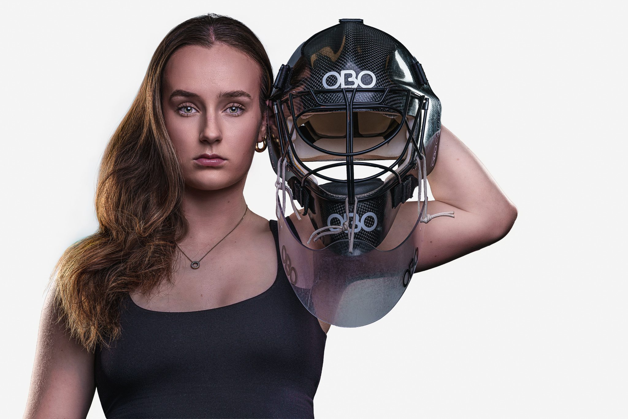 Hockey ACT athlete identity portrait with goalkeeper helmet