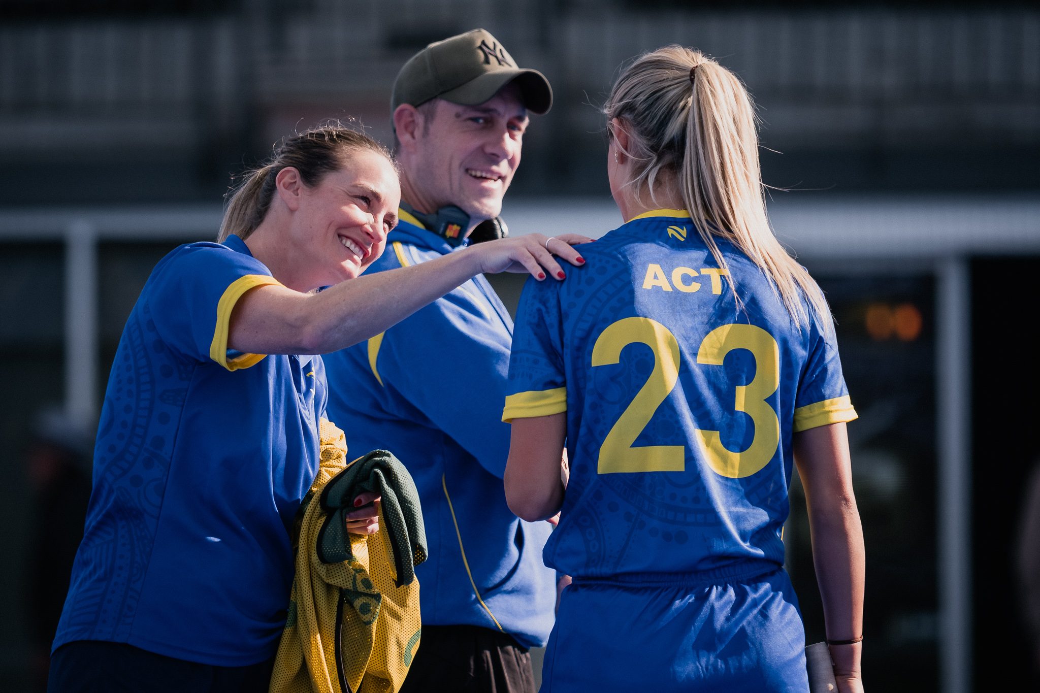 Hockey ACT coach working with a player during a session