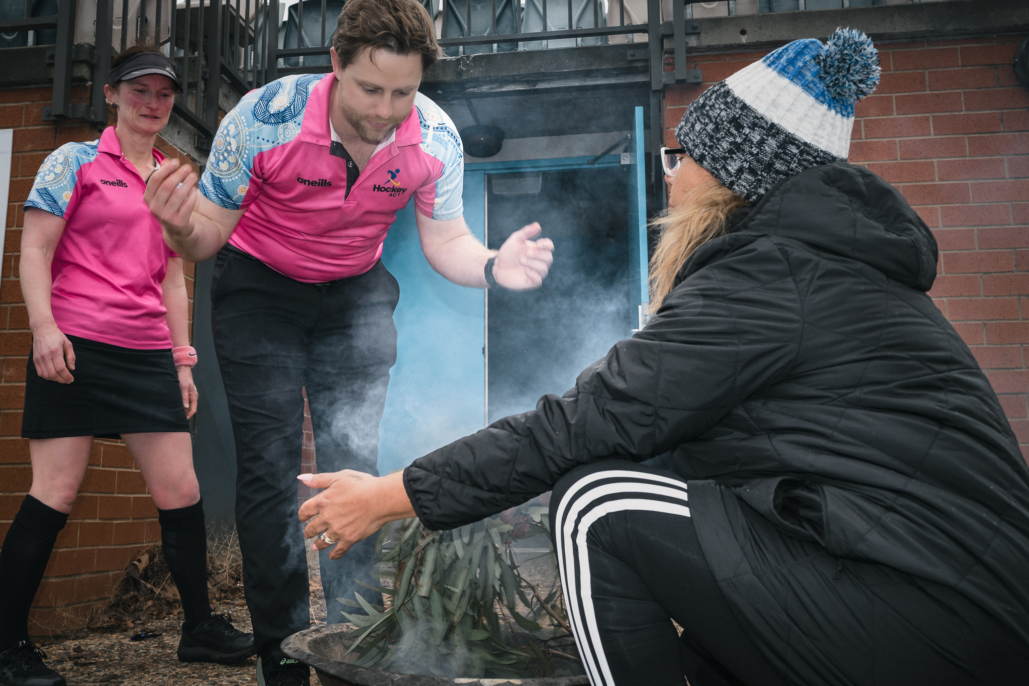 Hockey ACT Reconciliation Round — traditional smoking ceremony and Welcome to Country, officials cleansed by an Aboriginal elder, institutional values documentation