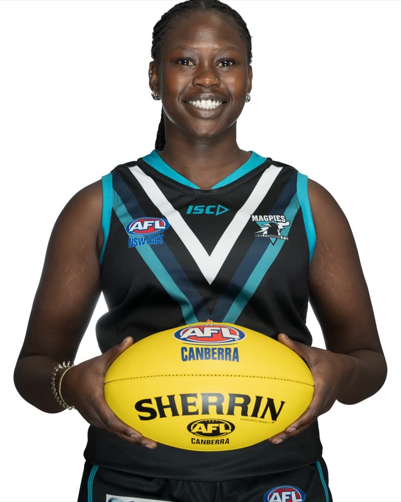 AFL Canberra Media Day studio portrait, club guernsey and sponsor marks legible