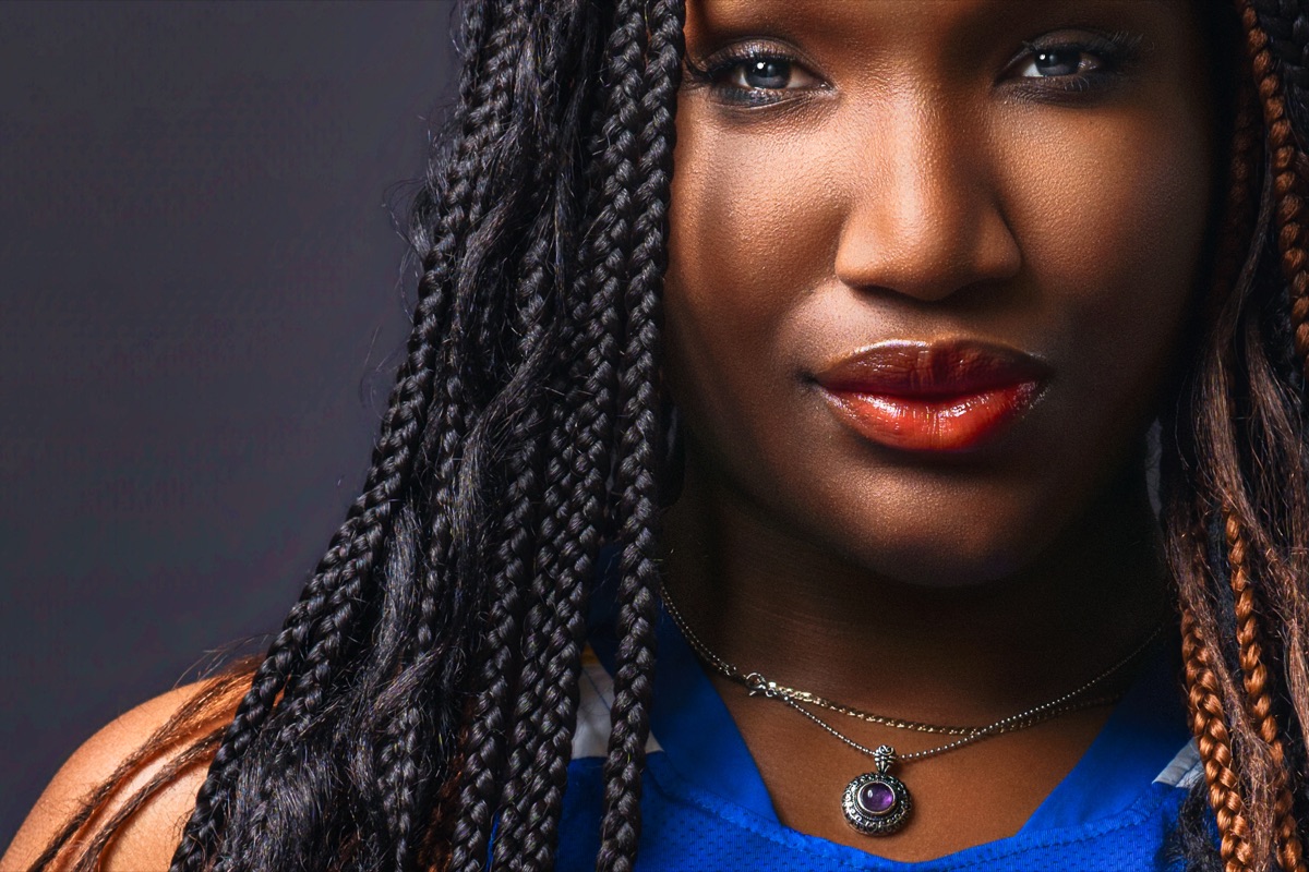 Basketball player in a tight front-on studio close-up