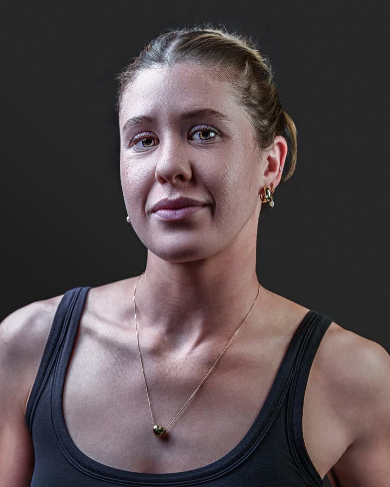 Hockey ACT pathway athlete identity portrait, hair up, match-ready presentation