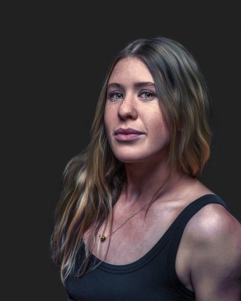 Lucy Nash, Hockey ACT, studio identity portrait on black