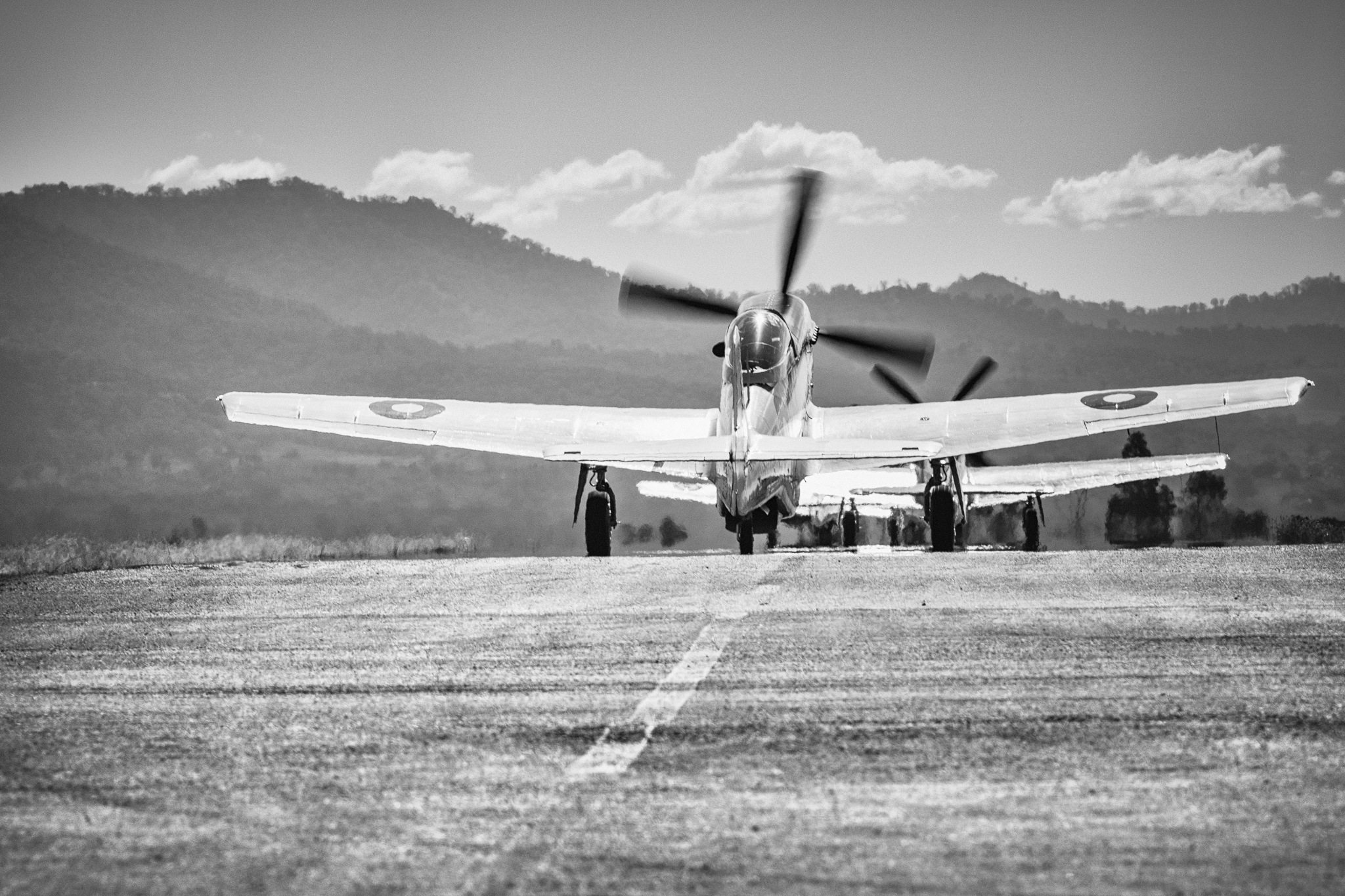 Mustang head-on landing roll, mountains